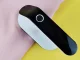 Elektriskais audumu un apģērba pūku noņēmējs ar LCD displeju, 5W, melns/balts
