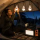 Daudzfunkcionāla LED kempinga lampa ar saules paneli, FM radio un Bluetooth, Melna/Oranža