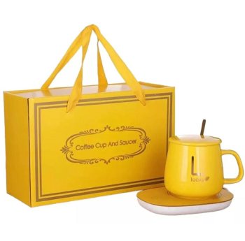 Electric mug warmer with cup, lid and spoon, yellow