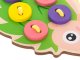 An educational set for sewing button sewing, green hedgehog