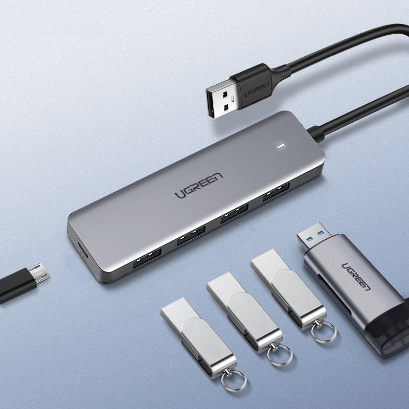Ugreen USB centrmezgls - 4x USB 3.2 Gen 1 ar micro USB barošanu, pelēks (CM219)